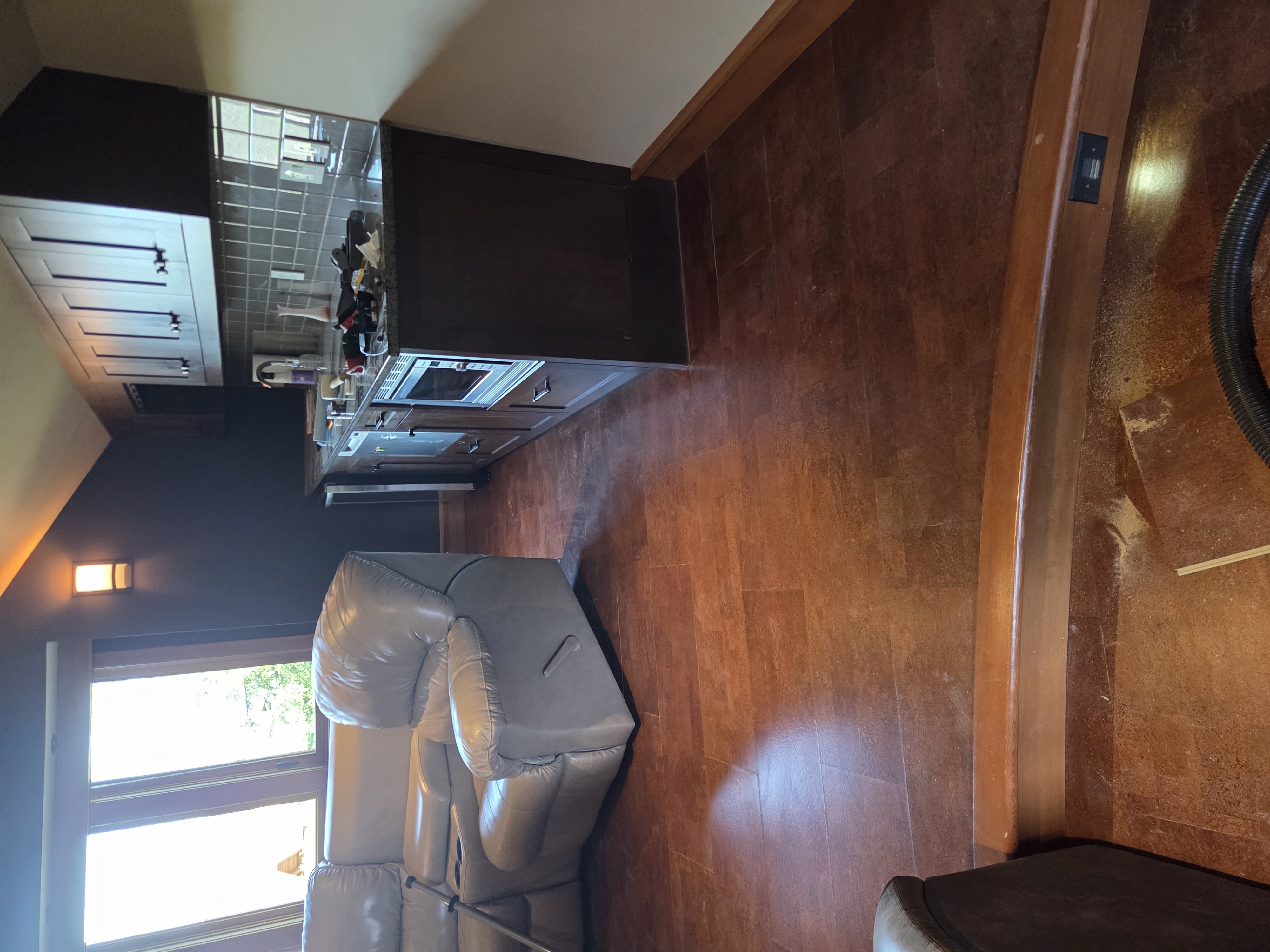 Finished suite with LVP flooring and clean baseboard trim — basement development Nanaimo